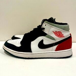 Jordan 1 Mid Nike shoes - red and green with a black toe.  Men’s size 8.5